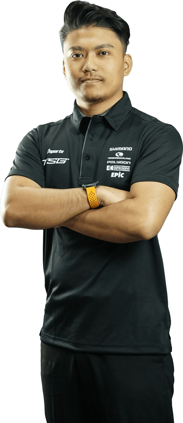 Syed Ahmad Azamuddin standing with arms crossed in team polo